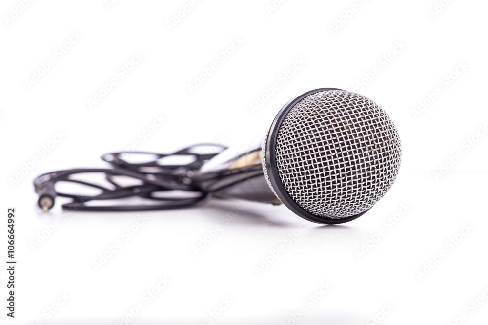 Close up old microphone isolated on white Close up old microphone isolated on white
