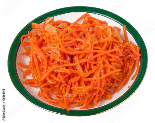 Hot carrot salad in plate on white background