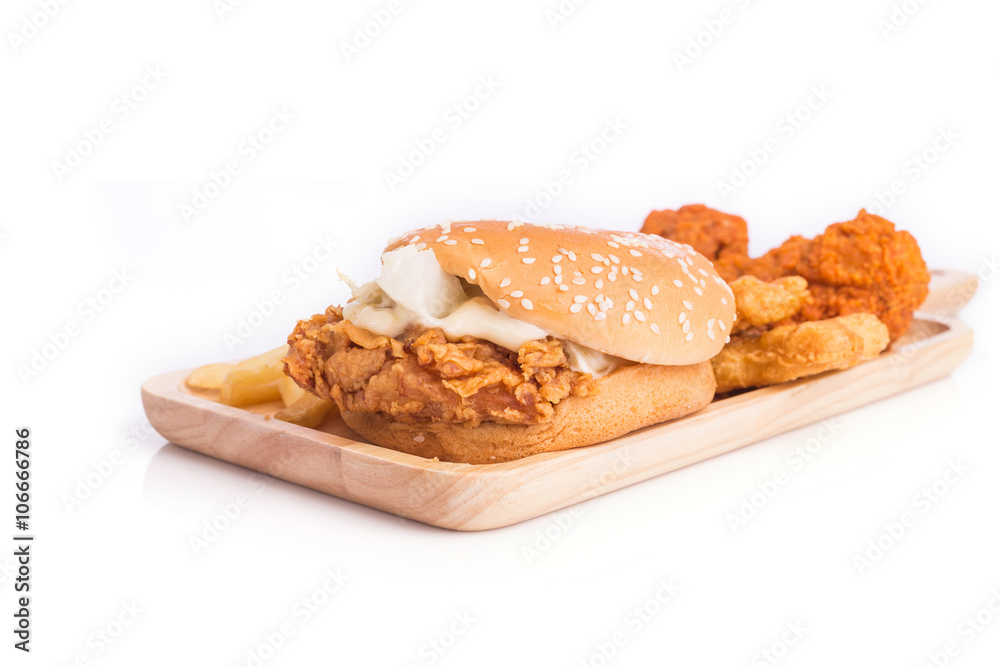 Fried chicken, french fries and soft drink on wooden table Fried chicken, french fries and soft drink on wooden table