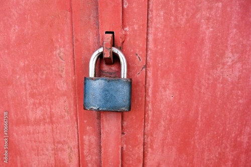 metal padlock on a metal door