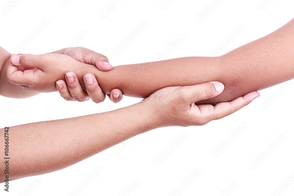 Woman's hand holding children's elbow. Elbow pain concept Woman's hand holding children's elbow. Elbow pain concept