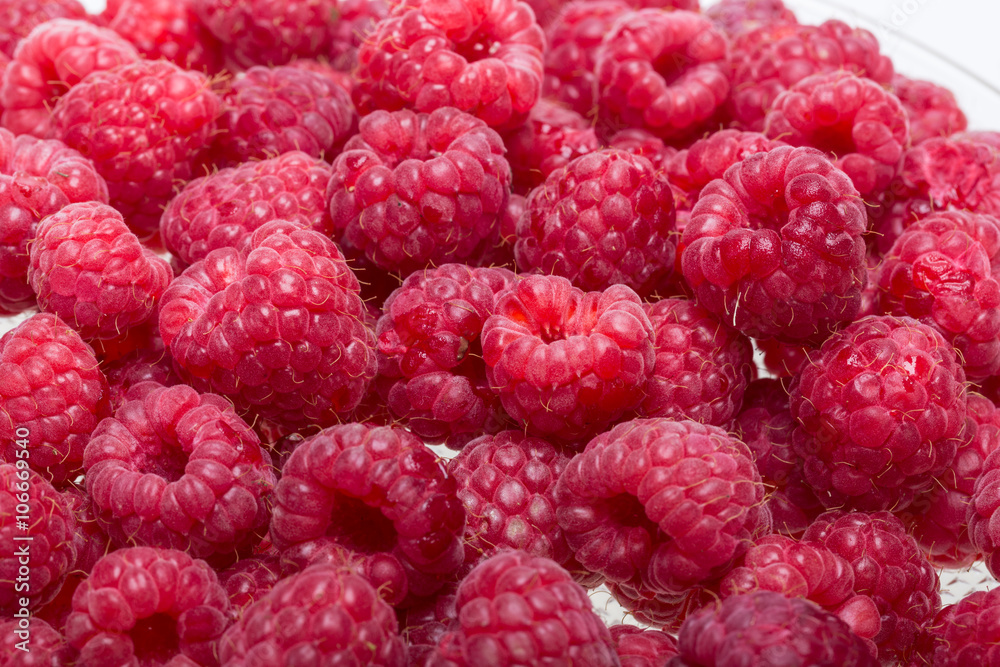 A beautiful selection of freshly picked ripe red raspberries. A beautiful selection of freshly picked ripe red raspberries.