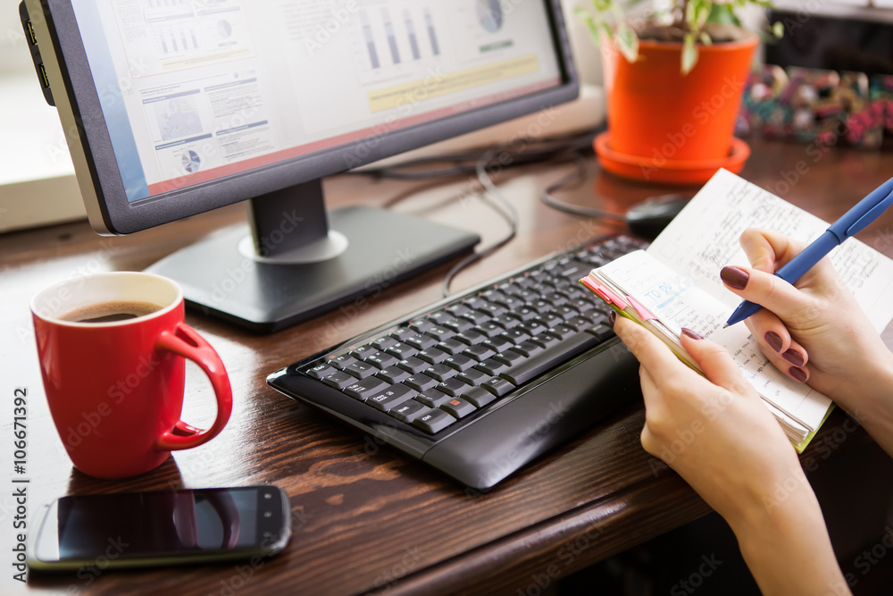 Woman working at home.