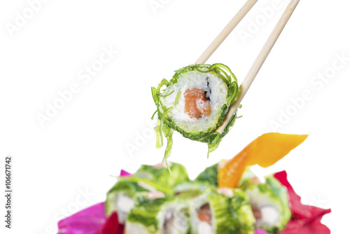 Sushi on sticks, isolated on white, shallow depth of field