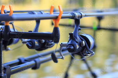 Carp Fishing rods with reel set up on holder