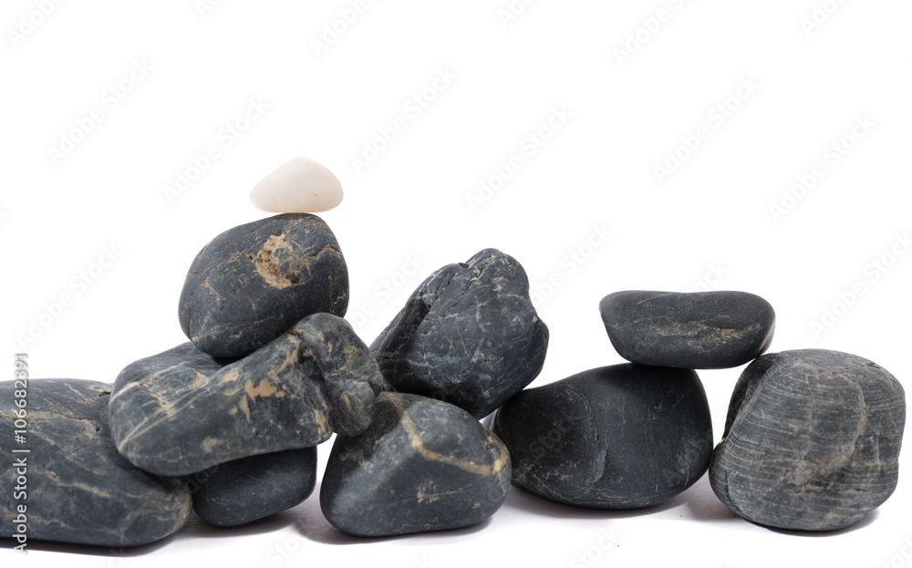 Heap of black stones isolated on white Heap of black stones isolated on white