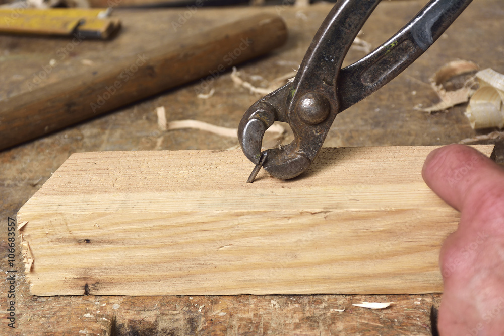 carpenter working with plane on wooden carpenter working with plane on wooden