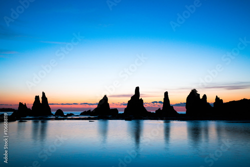 breaking dawn of Hashikuiiwa rock shadow,Kushimoto area,wakayama,japan photo