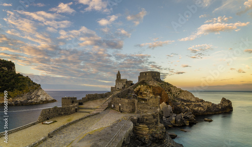The castle on a rocky cliff above the mediterranean sea