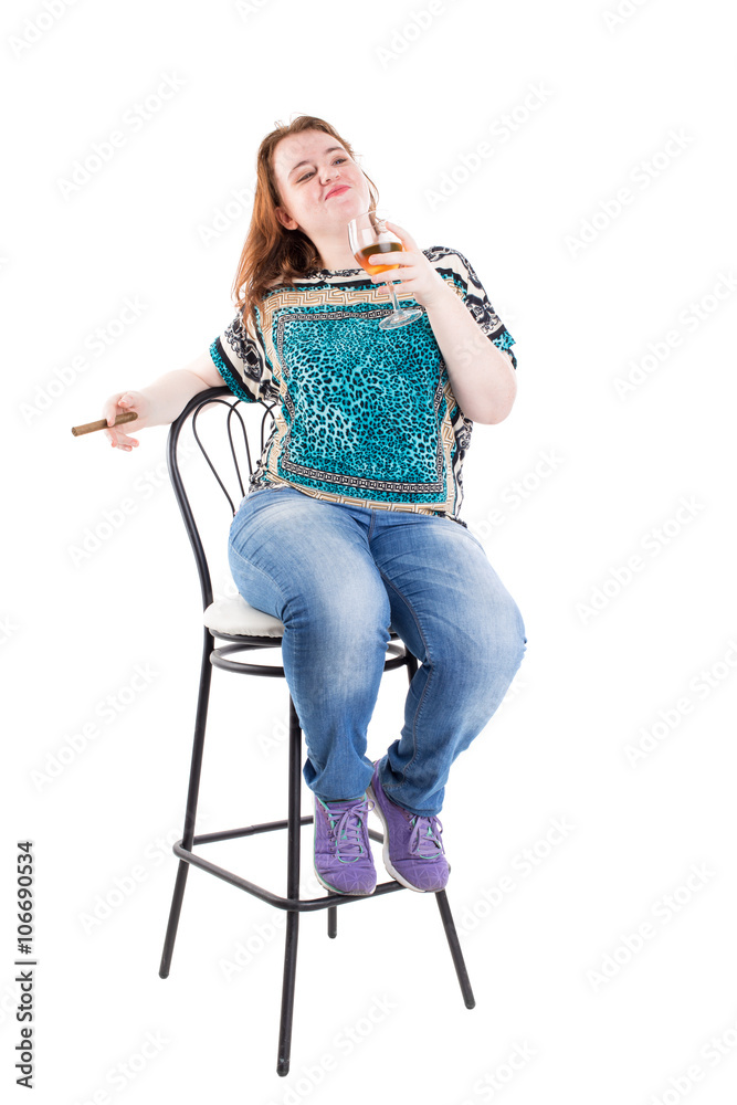 Fototapeta premium Smiling redhead plus size model with cigar.