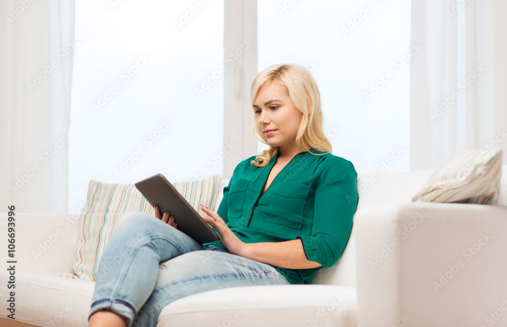 smiling woman with tablet pc at home smiling woman with tablet pc at home