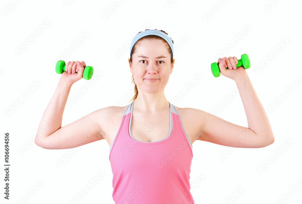 Sporty young woman doing workout with green dumbbell. isolated on a white background Sporty young woman doing workout with green dumbbell. isolated on a white background
