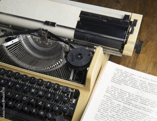 Old typewriter with a sheet of paper