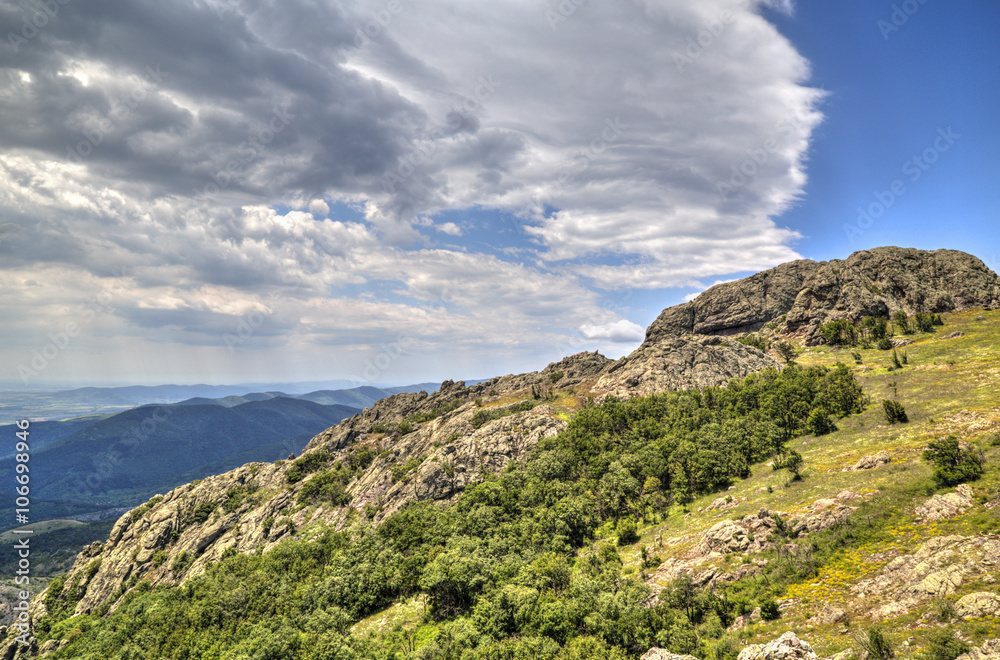 Beautiful mountain landscape with dramatic sky clouds