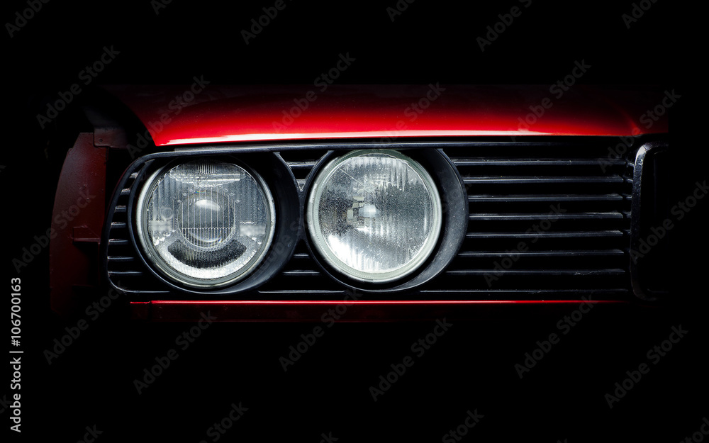 Fototapeta Reflektory stara czerwona samochodowa zakończenie fotografia