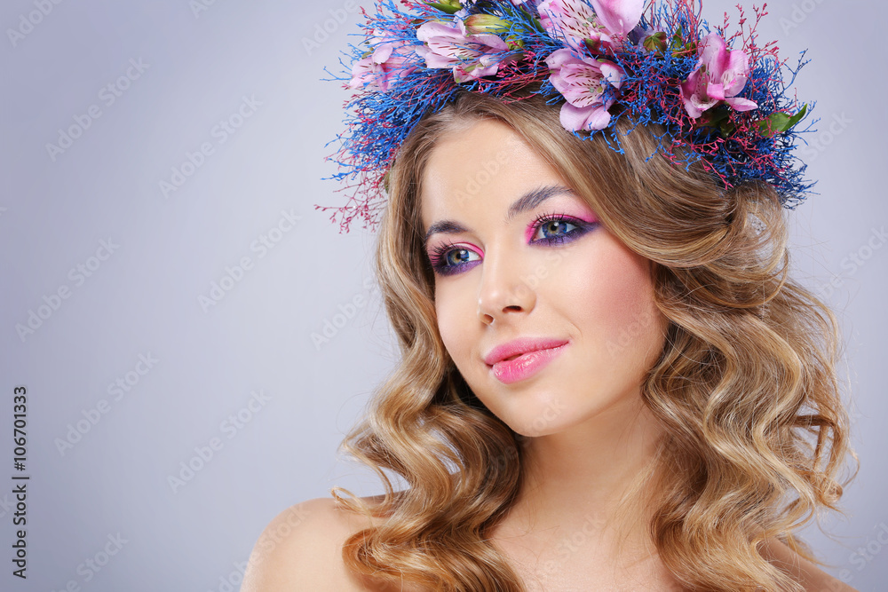 Beautiful young woman in wreath