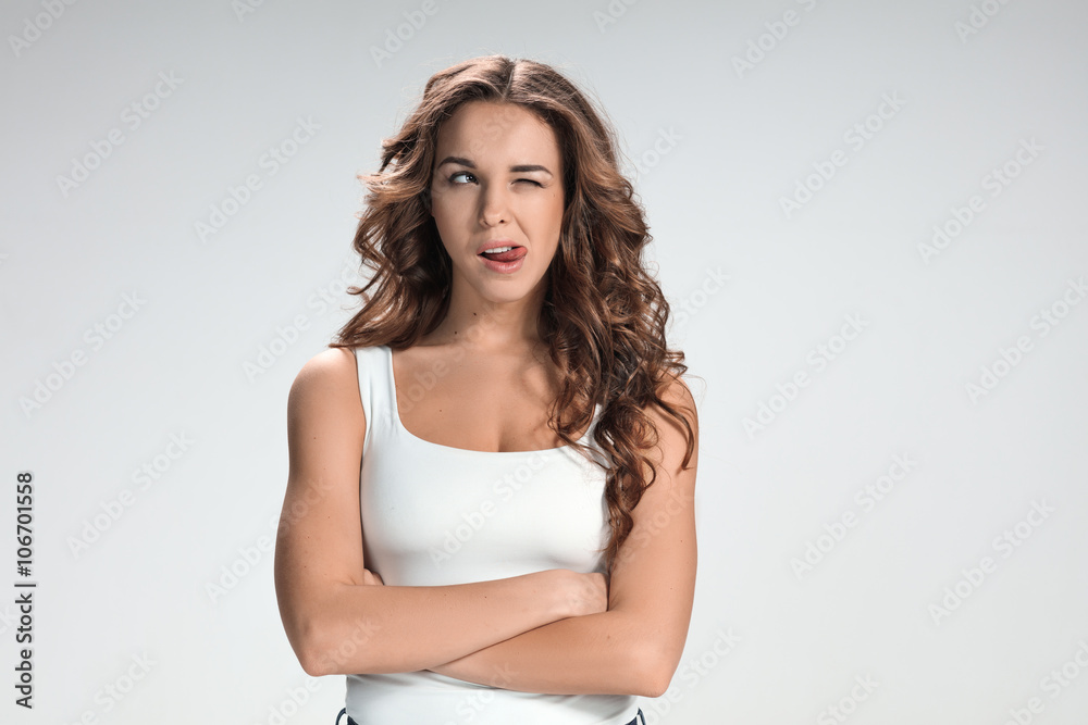 The young woman's portrait with funny emotions The young woman's portrait with funny emotions