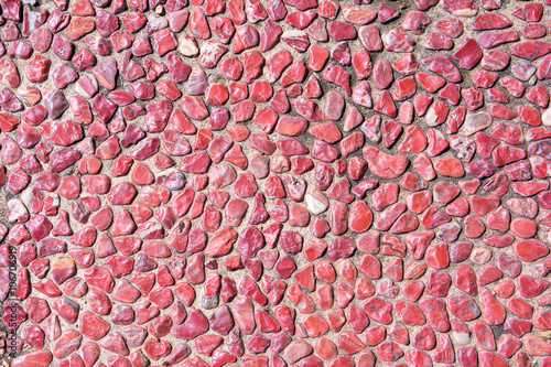 Red pebble on floor background