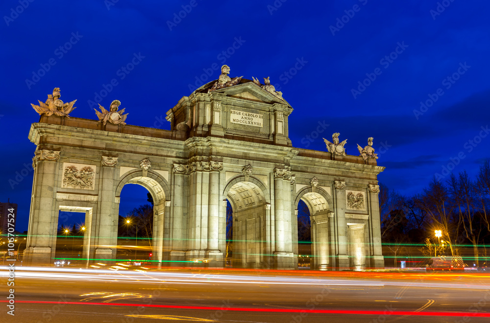 Madrid, Spain at Puerta de Alcala gate at dusk