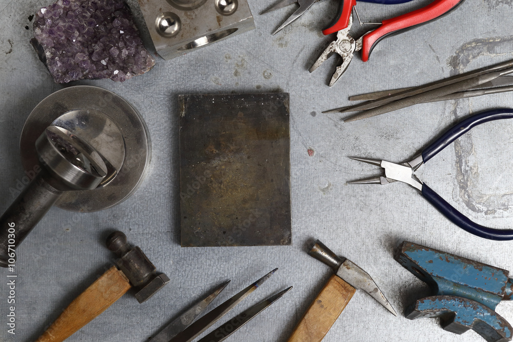 Fototapeta premium Tools set of jewellery. Jewelry workplace on metal background with copy space for text. Top view.