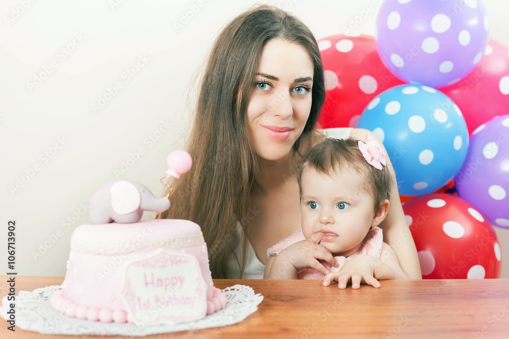 Mother with funny baby celebrating first birthday. Cake. Mother with funny baby celebrating first birthday. Cake.