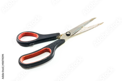 old scissors on white background.