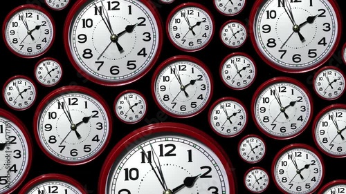 Track down over many time lapse clock faces all showing the same time but going backwards. Going back in time. Looking back.