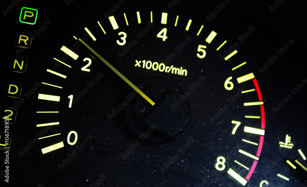 The tachometer on the instrument panel in the car The tachometer on the instrument panel in the car
