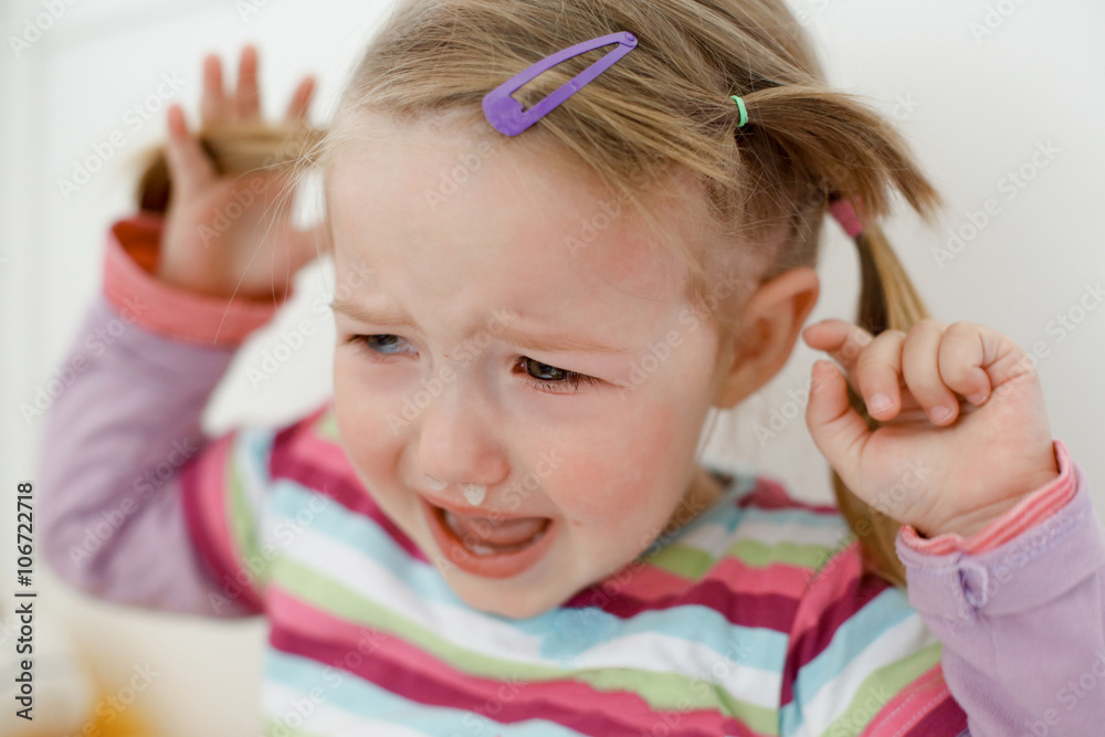 Crying little toddler, having a tantrum