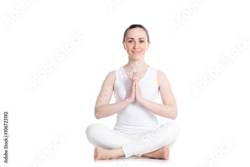Cheerful girl meditating