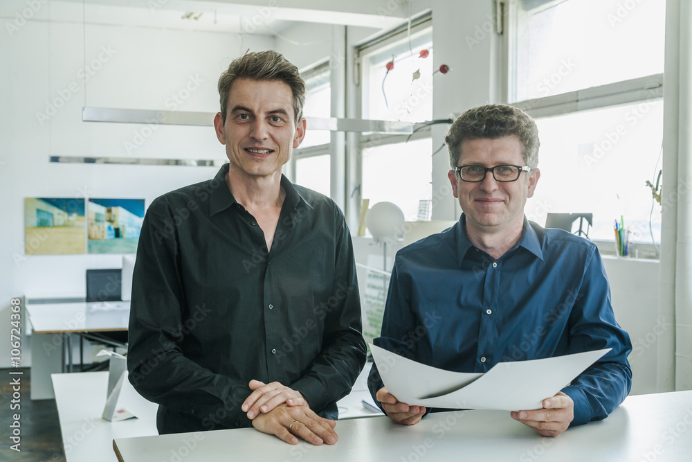 Two designers in their studio with workpiece