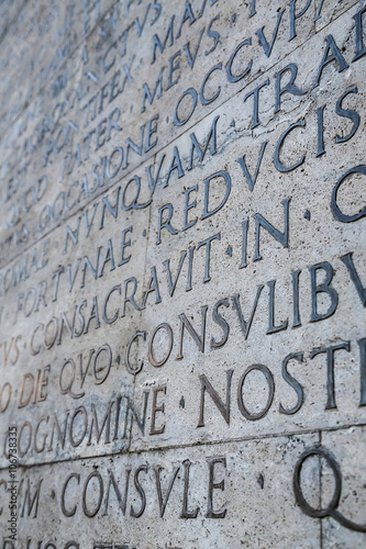 Latin inscription on wall in Rome, Italy