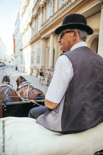 Austria, Vienna, coachman on his fiaker in the city