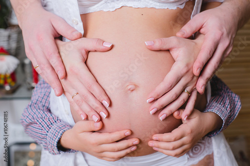 Wallpaper Mural pregnant woman and hands Torontodigital.ca