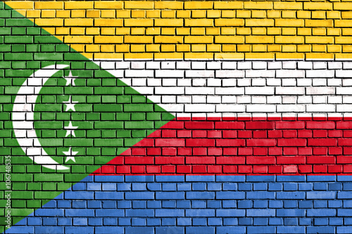 flag of Comoros painted on brick wall
