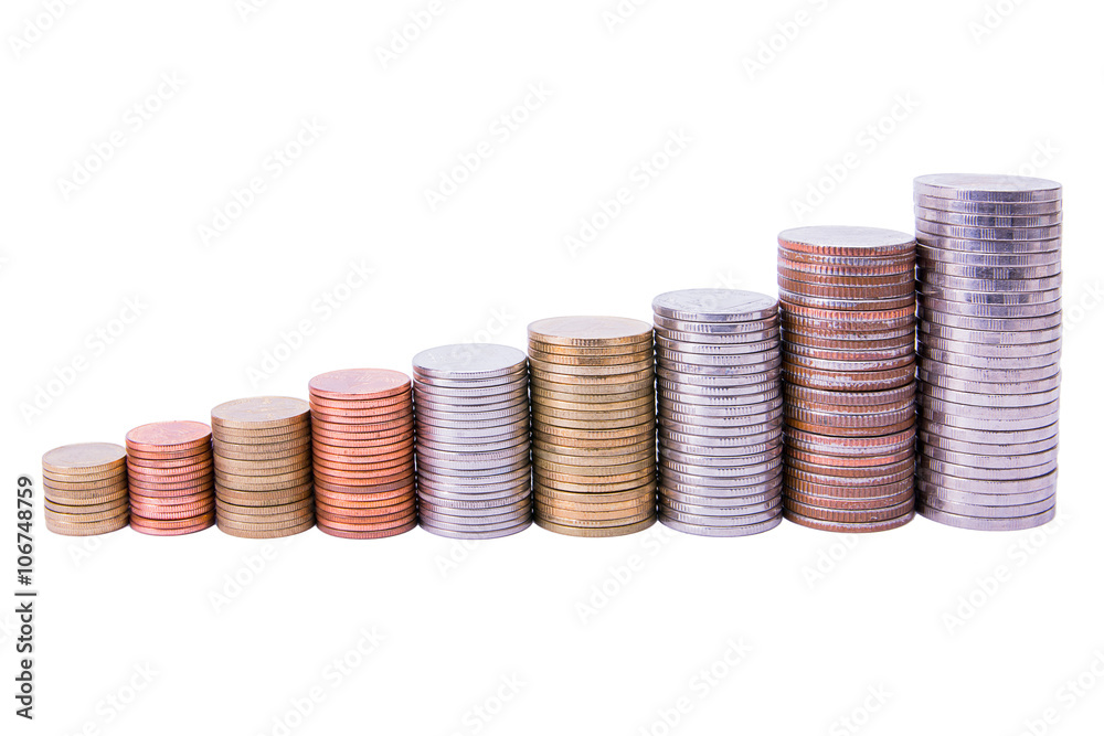 Piles of coins forming a growing graph isolated on white backgro Piles of coins forming a growing graph isolated on white backgro