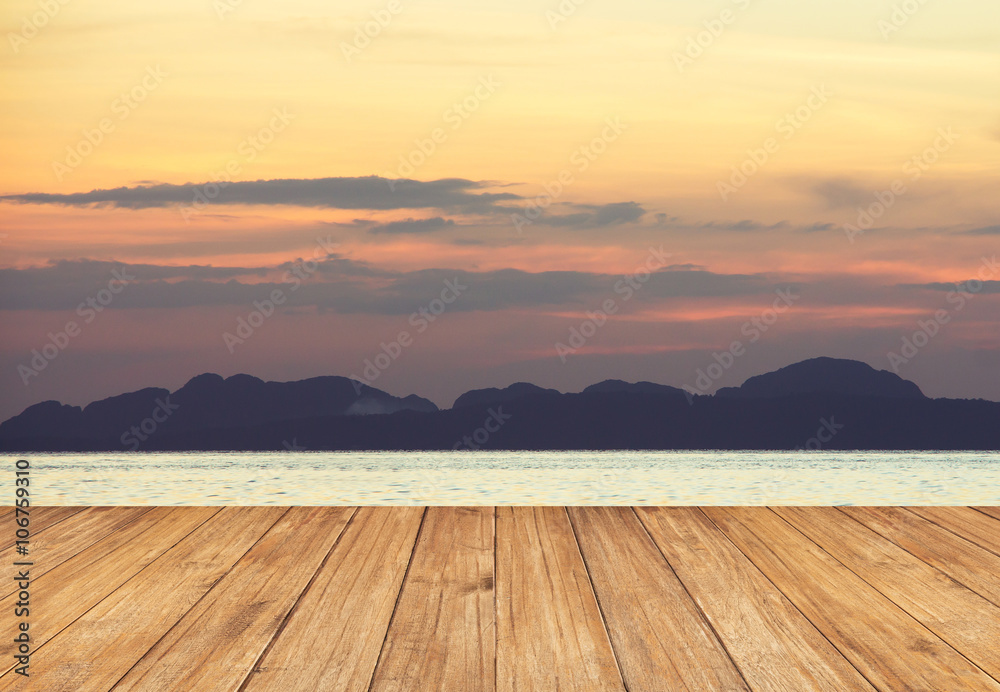 Perspective of wood terrace against beautiful seascape at sunset Perspective of wood terrace against beautiful seascape at sunset