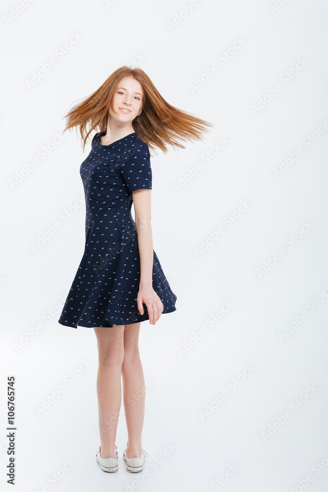 Fototapeta premium Happy beautiful woman looking back at camera