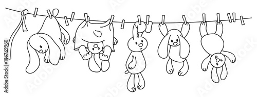 Vector hanging  rabbits cartoons on clothing line with pegs.