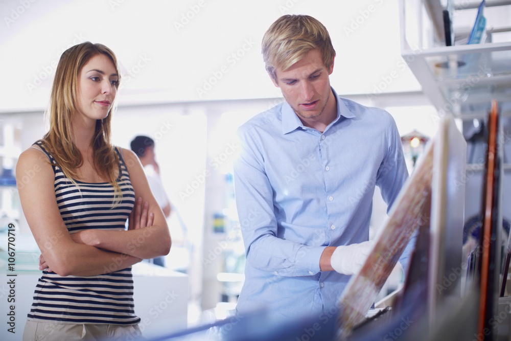 Young couple in a stained glass salesroom