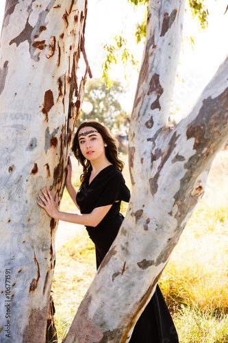 Fototapete portrait of young lady in black dress