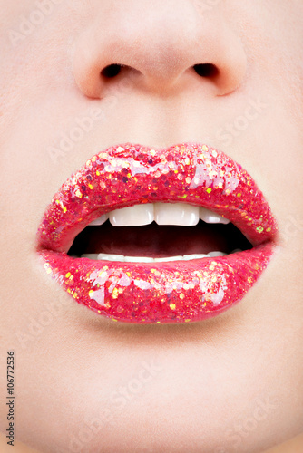 beautiful female lips with shiny red gloss lipstick