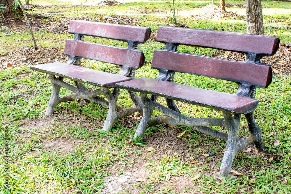 Two seating bench made from concrete look like wooden bench styl Two seating bench made from concrete look like wooden bench styl