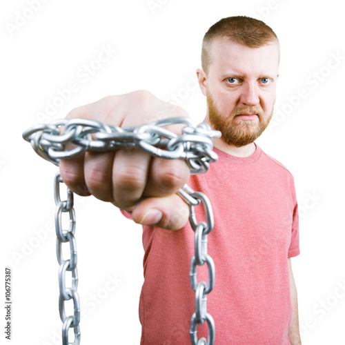 Bearded man with a chain around the fist photo