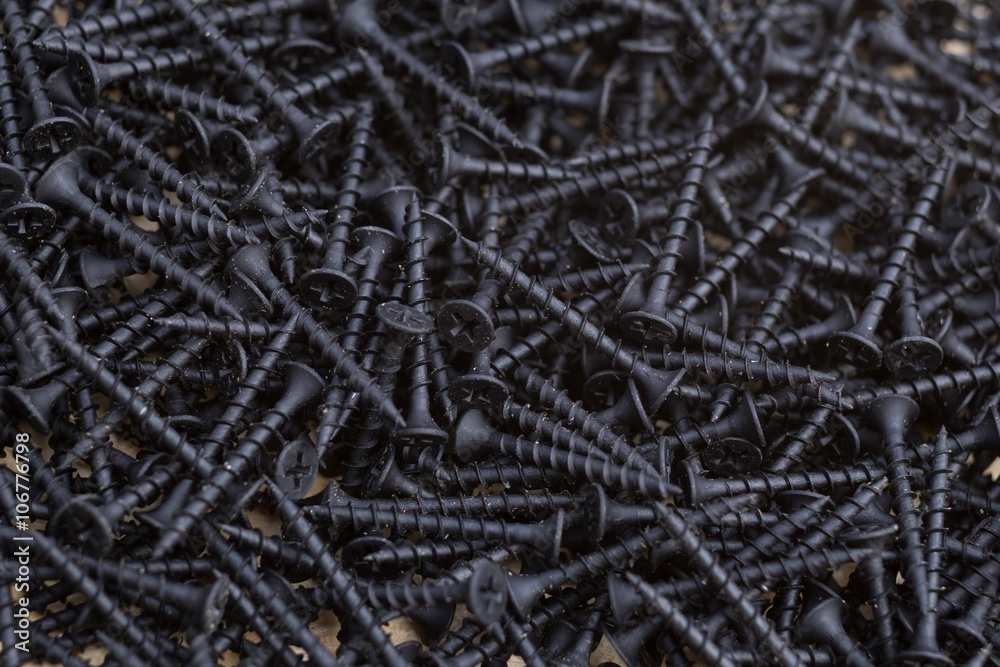 Screws on the osb plank top view. Isolated background with copy space. Concept for construction, repair. Screws on the osb plank top view. Isolated background with copy space. Concept for construction, repair.