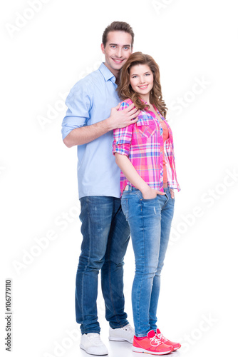 Full portrait of happy young couple.