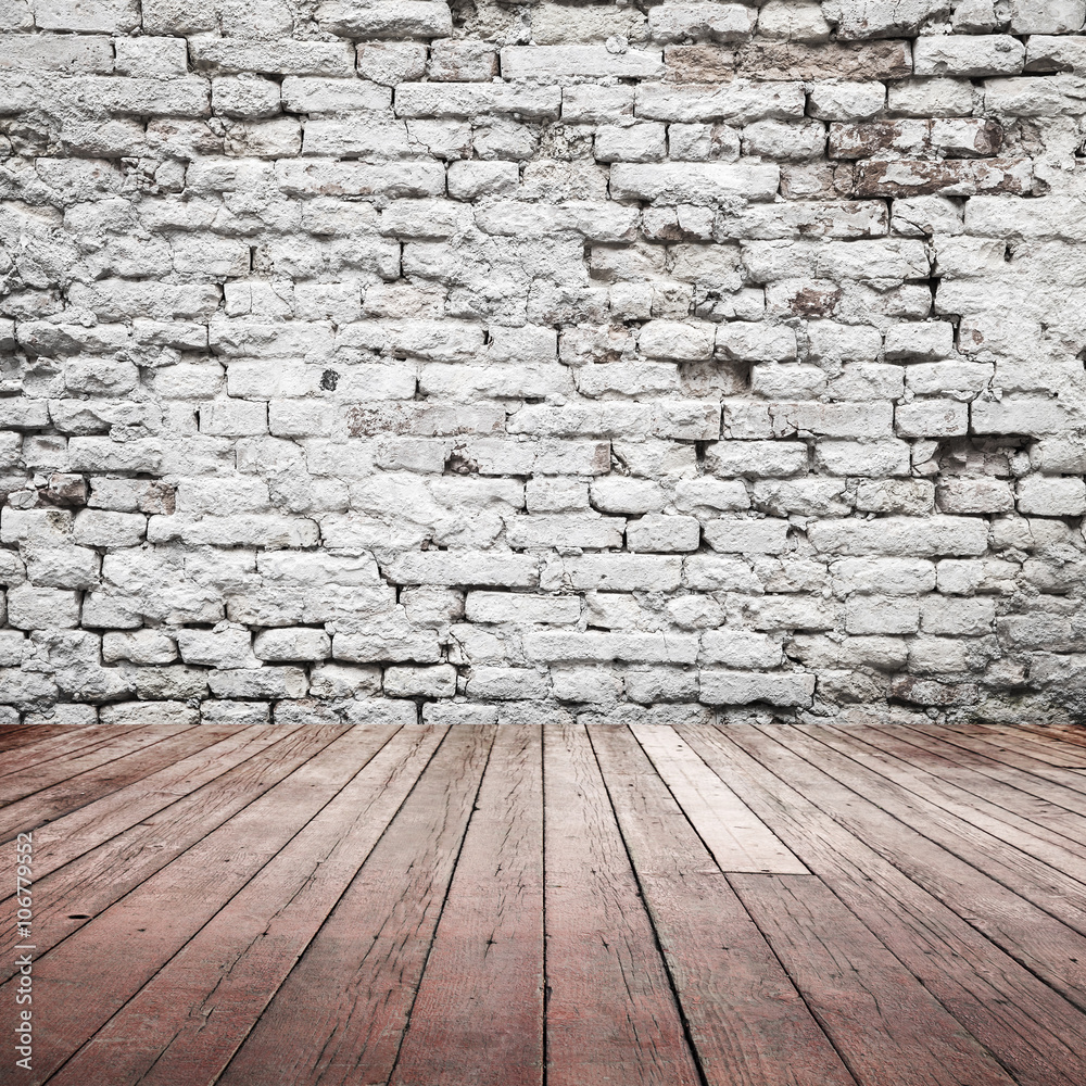 White brick wall and red wooden floor