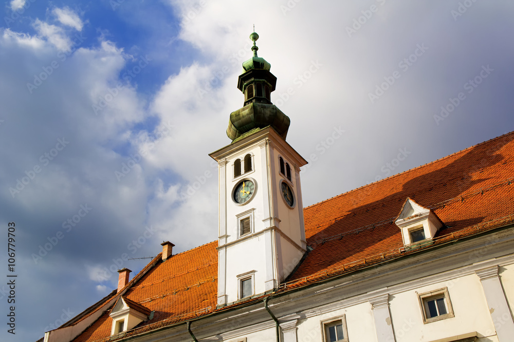 Old Town Hall (Rotovz) at Main Square (Glavni trg) of the city of Maribor. Sunset light during evening.