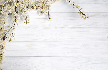 spring background. fruit flowers on wooden table