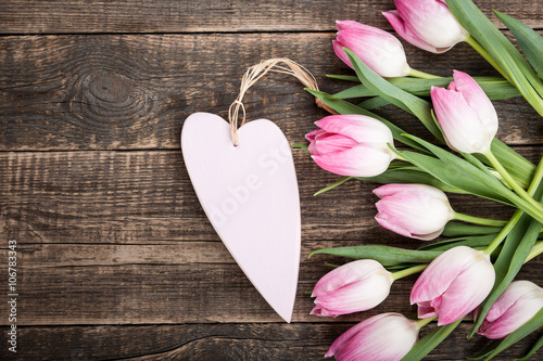 Fresh pink tulips and heart